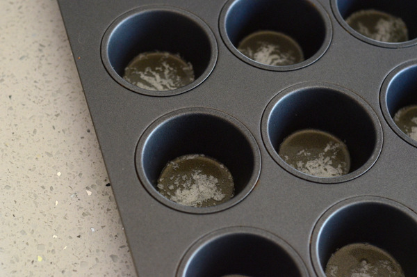 Buttering a Muffin Pan for Pancake Cups