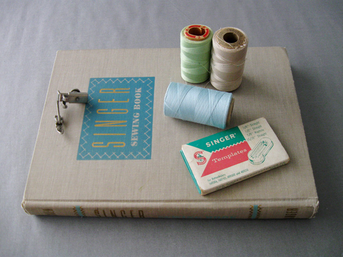 sewing supplies and book