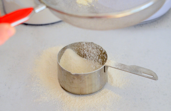 Sifting Cake Flour into a Measuring Cup