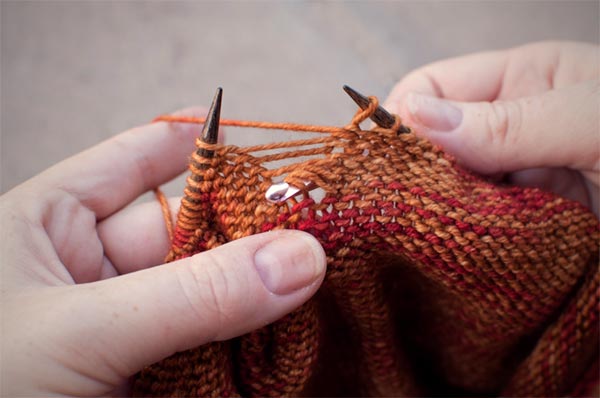 Fixing dropped stitches in knitting with a crochet hook