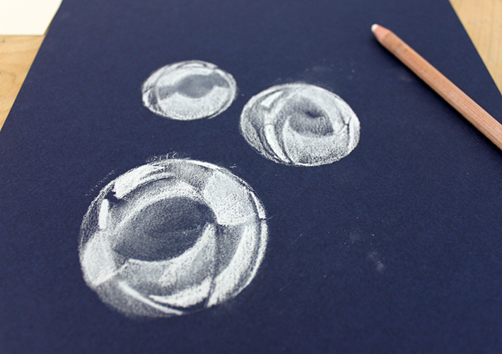Bubble smudge shaded with white charcoal