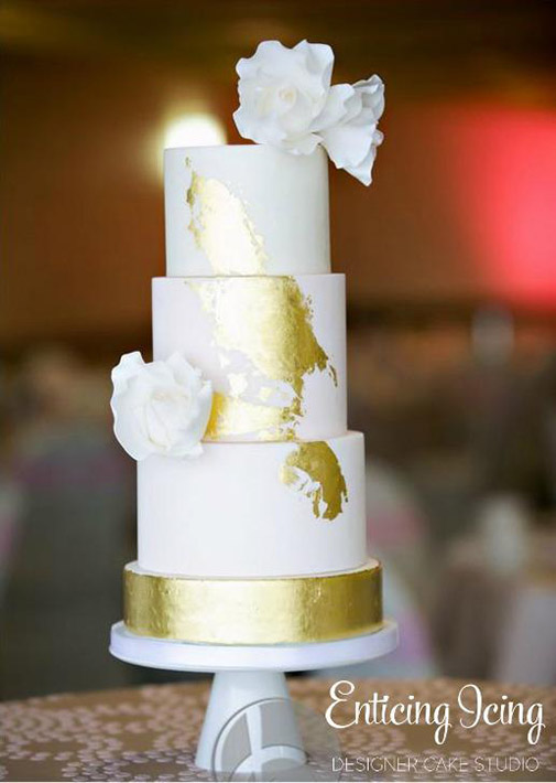 Modern white and gold wedding cake by Enticing Icing