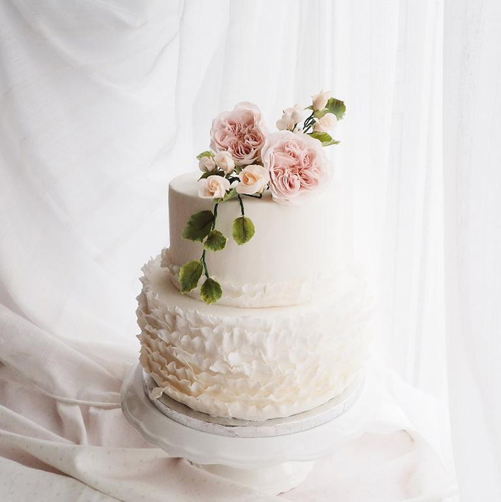 Pretty fondant ruffled wedding cake