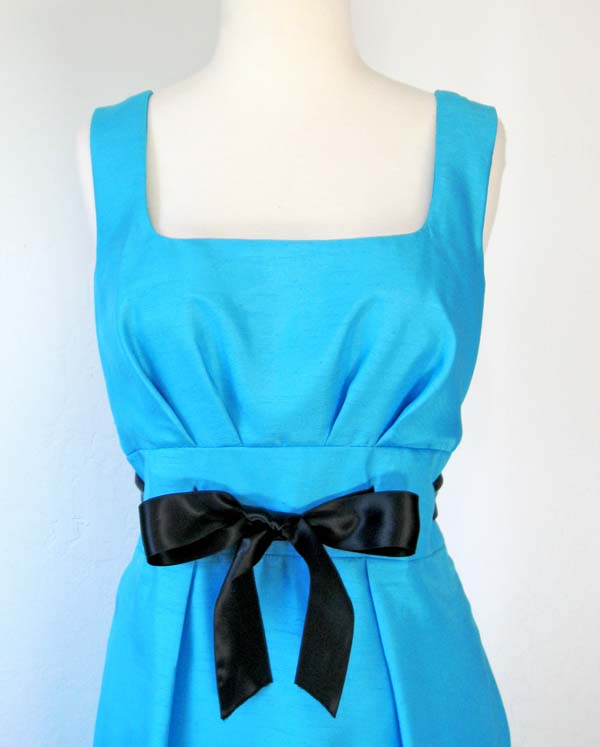 ribbon sash on blue dress