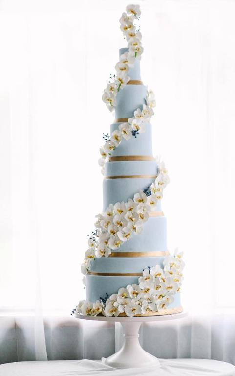 Towering orchid wedding cake by Alex Narramore
