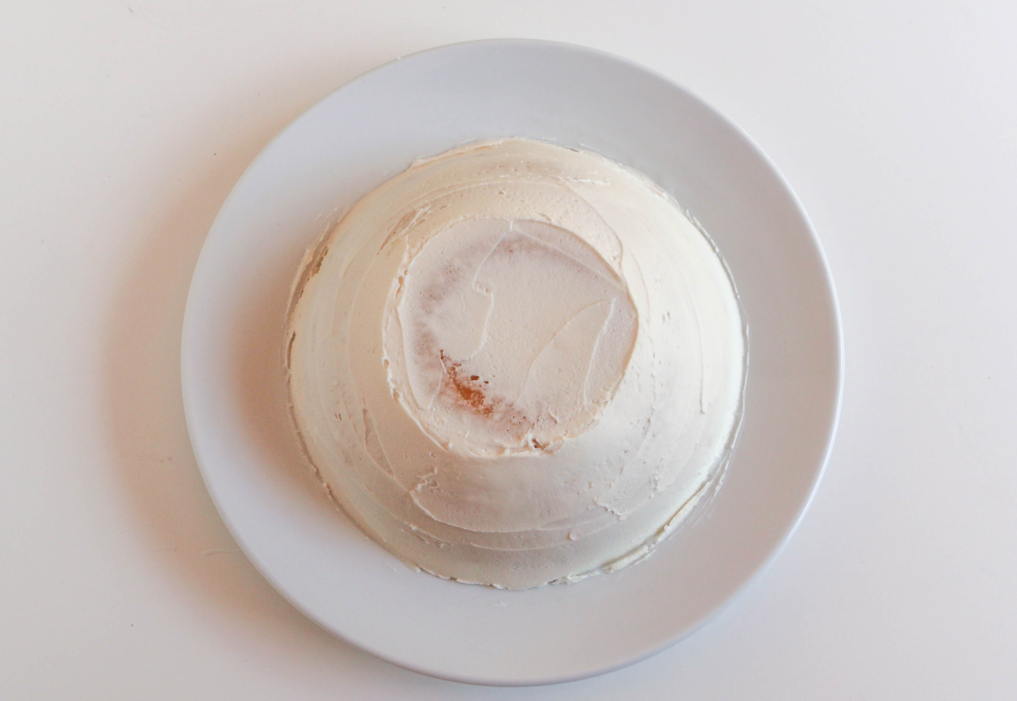 Half of the Cake Iced with White Buttercream | Erin Gardner | Bluprint