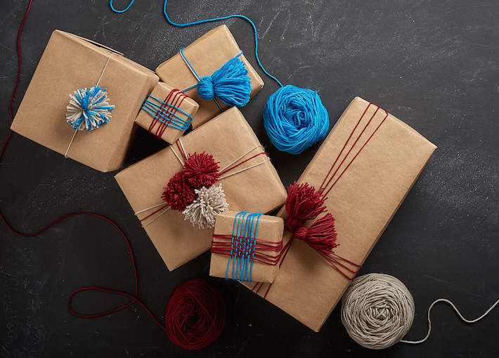 Gifts wrapped with yarn decorations