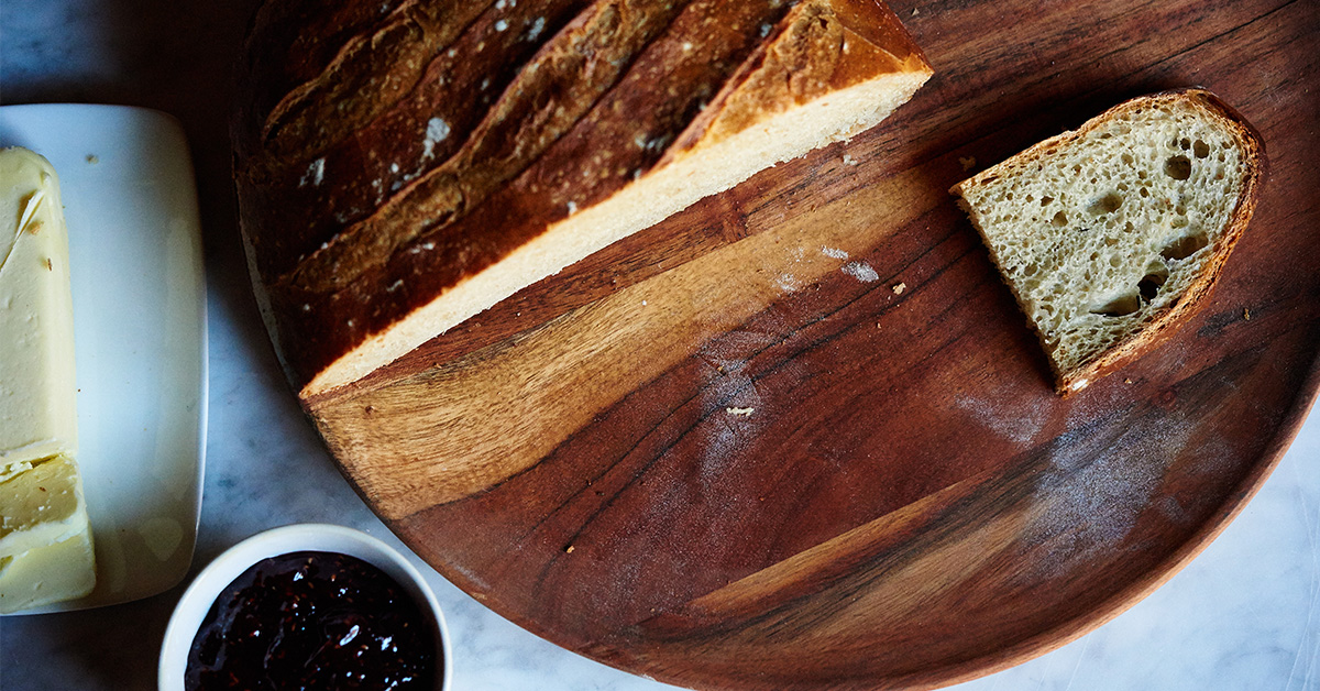 Slice of Bread on Wooden Serving Platter