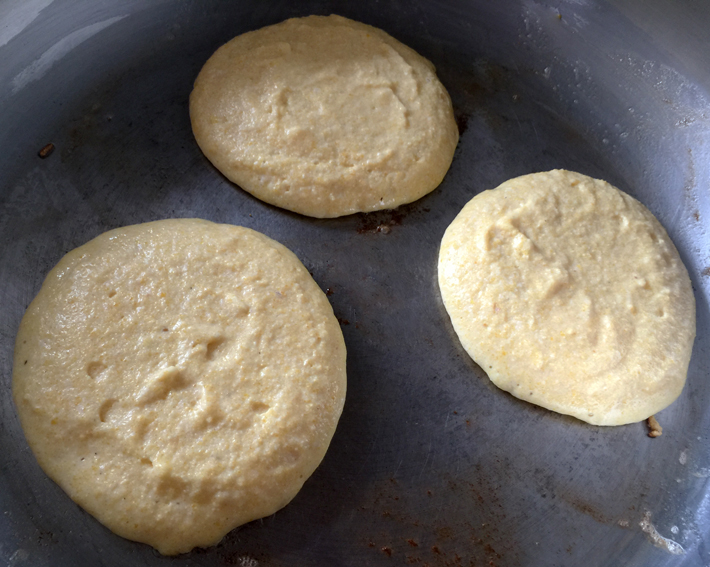 Cornbread Pancake Batter Cooking on a Skillet