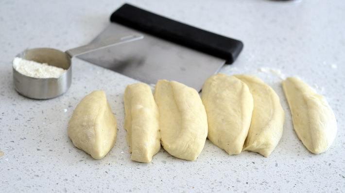 Divide pizza dough into six portions to make pretzels