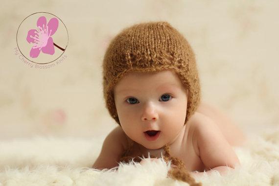 Adorable baby bonnet with lace edge