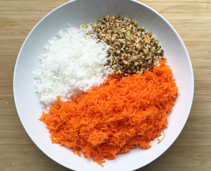 Shredded Carrots, Chopped Walnuts and Coconut Flakes — the makings of a delicious carrot cake!