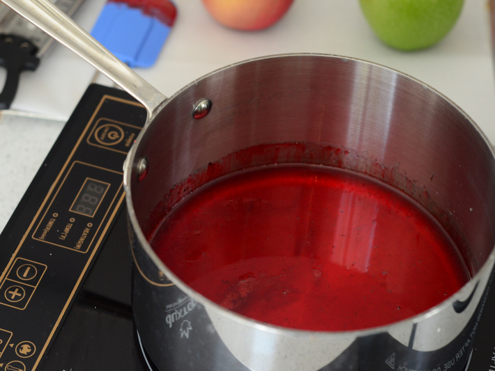 Hot Sugar with Red Food Coloring Added