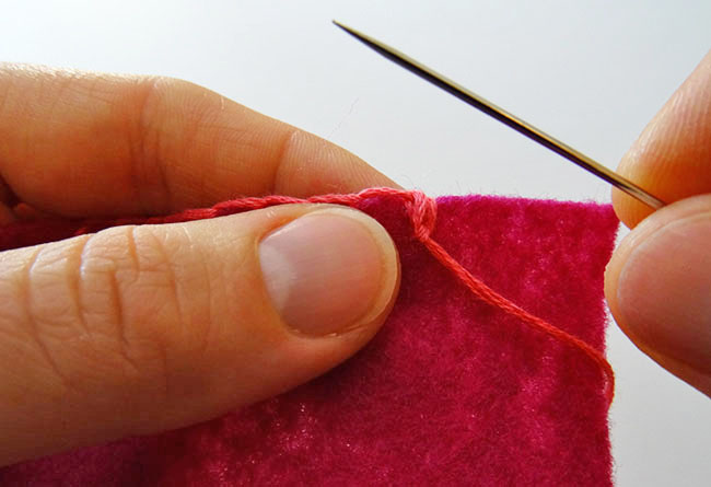 Pull to bottom of stitch for knot