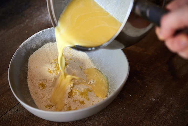 Pour Butter Mixture over Dry Ingredients