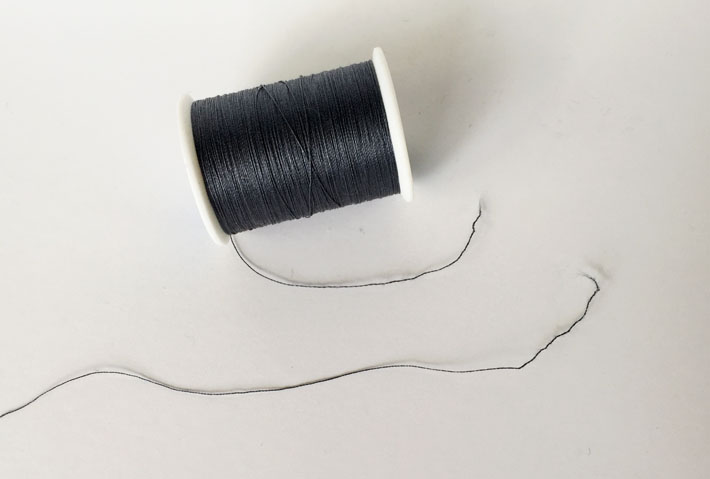 Broken Black Thread