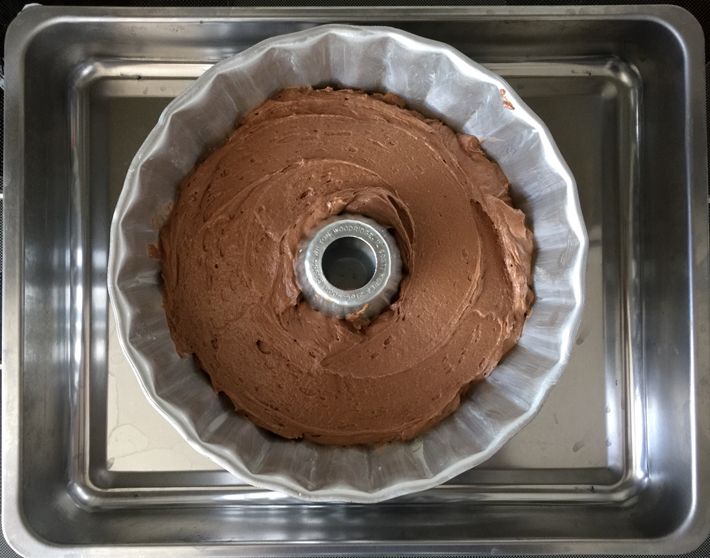 Chocolate cake batter in a bundt pan