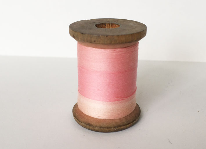 faded spool of thread