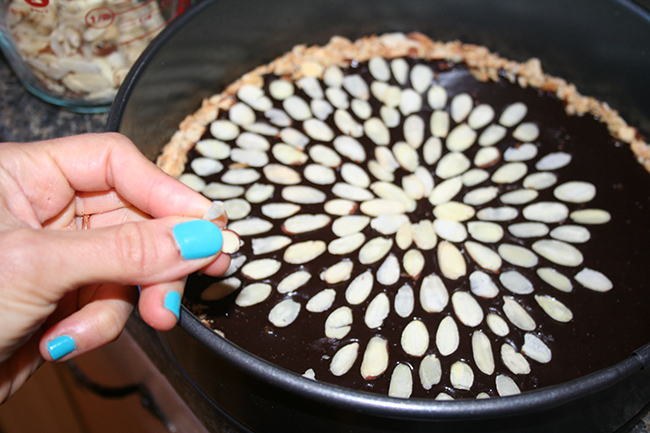Chocolate Ganache Tart With Almonds in Starburst Pattern