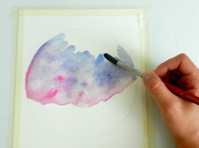 Start by adding a watercolor wash to paint your starry night sky