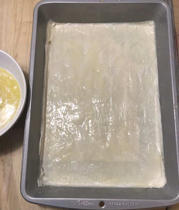 layer phyllo and butter
