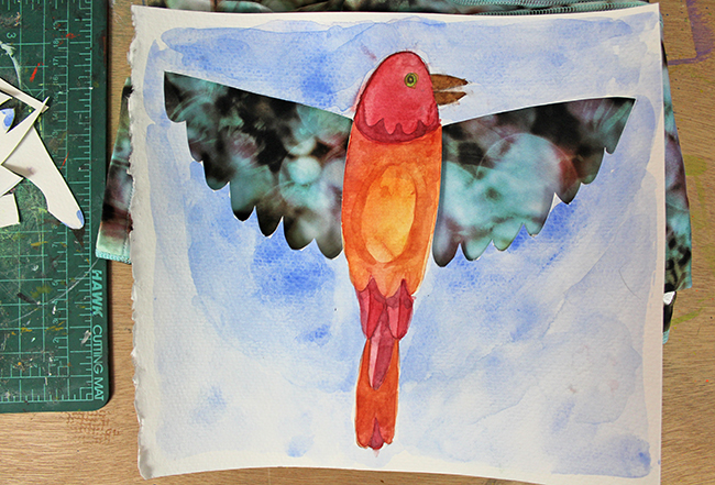 watercolor painting of a bird with wings cut out