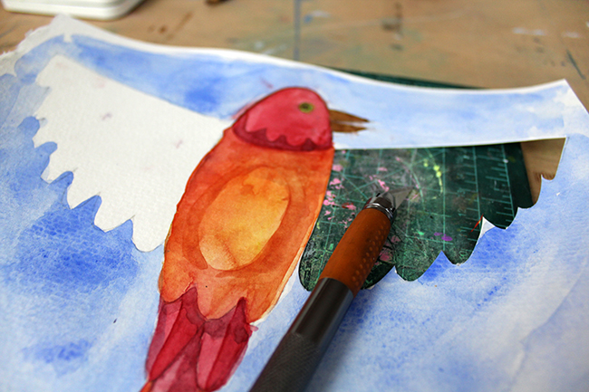 bird painting with half of the wing cut out