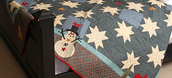 Holiday Quilt on Bed