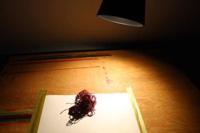 Ball of thread lit