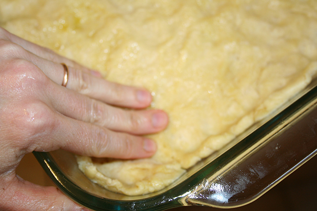 Press the dough into the pan