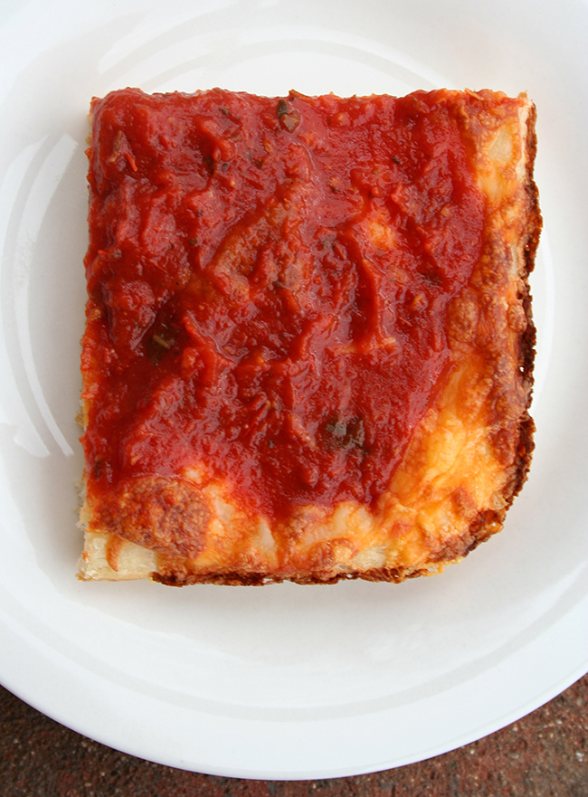 Detroit pizza slice