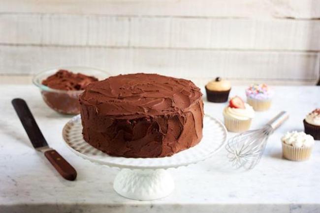 Chocolate Frosted Cake on a Cake Stand