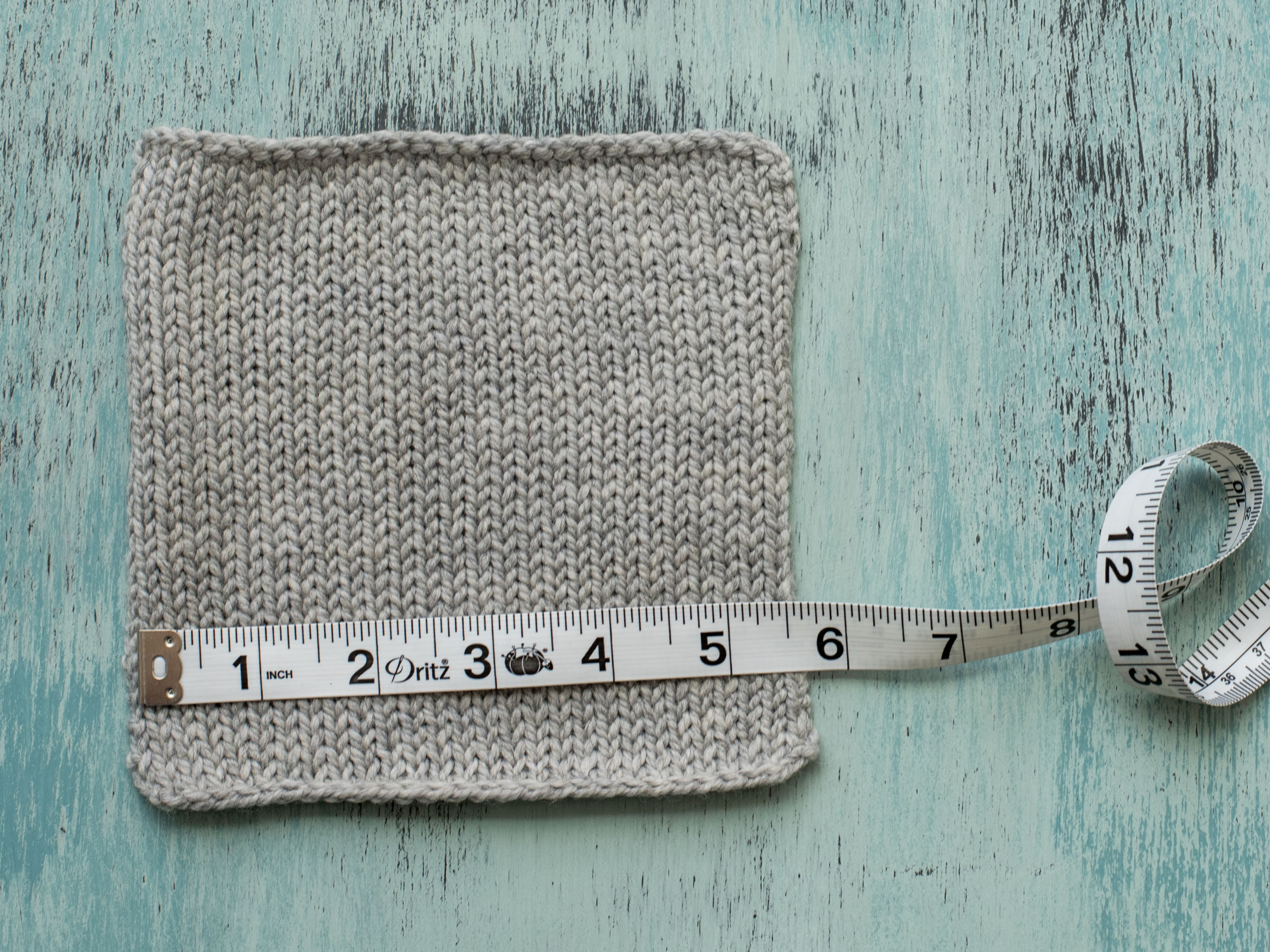 Measuring Stitch Gauge on Knit Gray Swatch