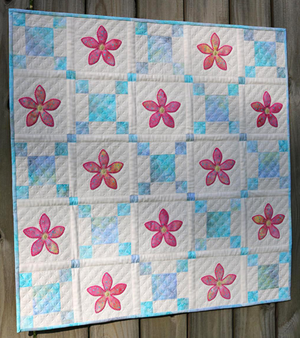 AccuQuilt dies make piecing and machine embroidery applique easy.