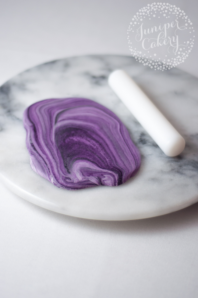 rolling out agate topper using rolling pin