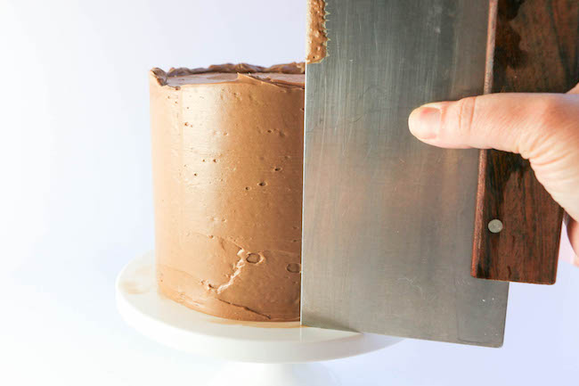 Smoothing the Final Coat of Buttercream | Erin Gardner