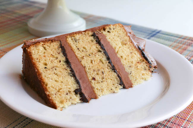 Slice of Hazelnut Cake with Chocolate Hazelnut Ganache and Buttercream | Erin Gardner
