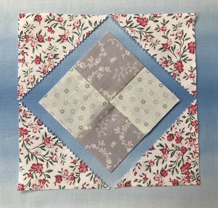 adding triangles to the charm squares