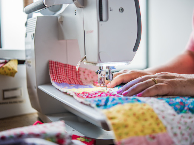 Sewing Machine Sewing on Quilt