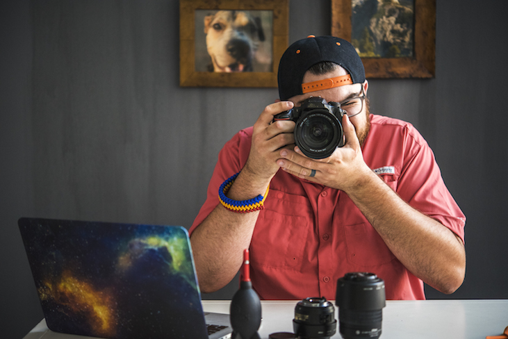 Brian Crawford Looking Through Camera