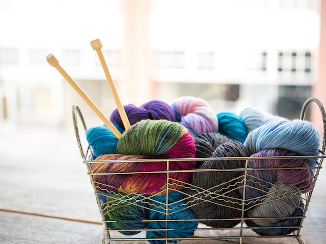 Cloudborn Yarn and Knitting Needles in Wire Basket