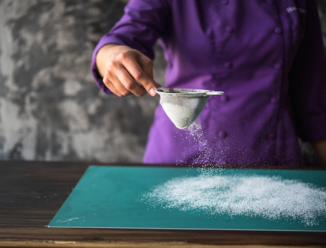Dusting Counter with Powdered Sugar