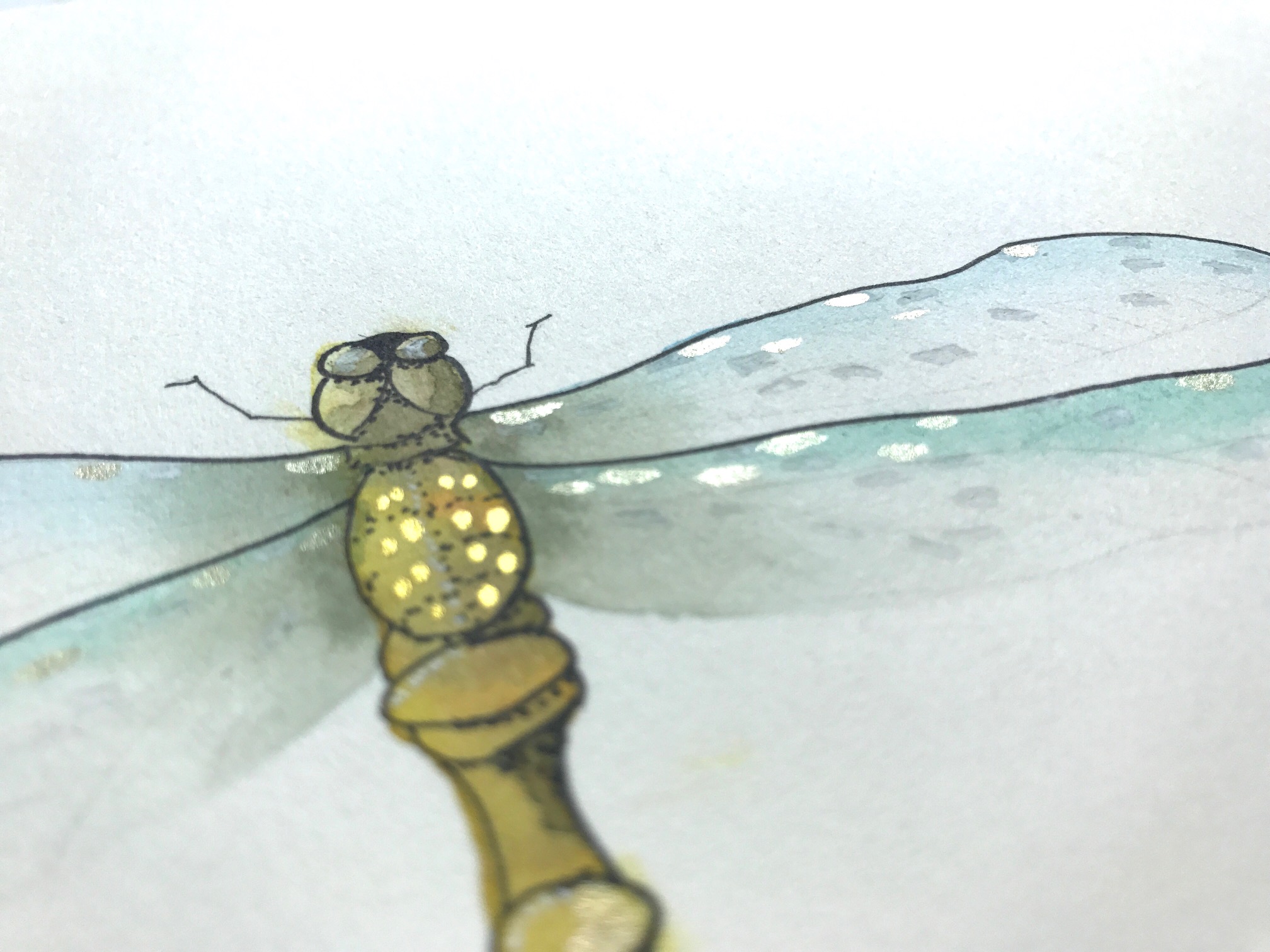 adding white gel pen to dragonfly