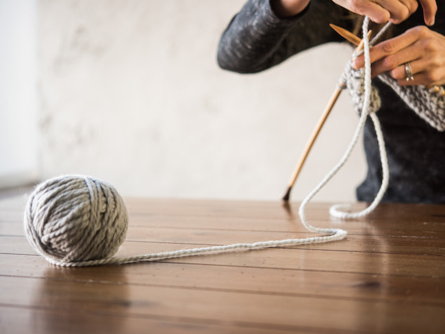 Knitting with gray yarn