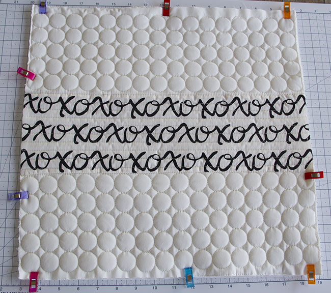 Pillow front, quilted with circles using a Handi Quilter Avante Prostitcher