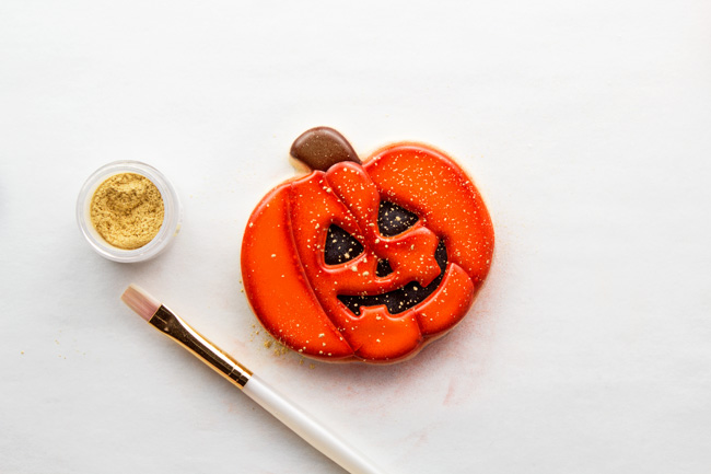 simple jack-o-lantern cookies made with royal icing