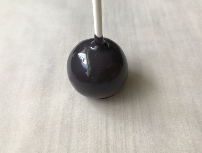 cake pop dipped in black candy