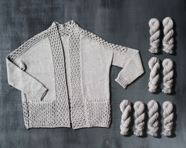 Knit Tealeaf Sweater With Skeins of Gray Yarn