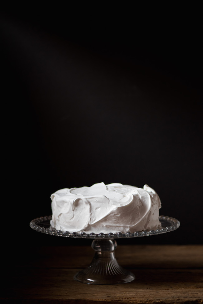 Frosted English Christmas Cake on Glass Cake Stand