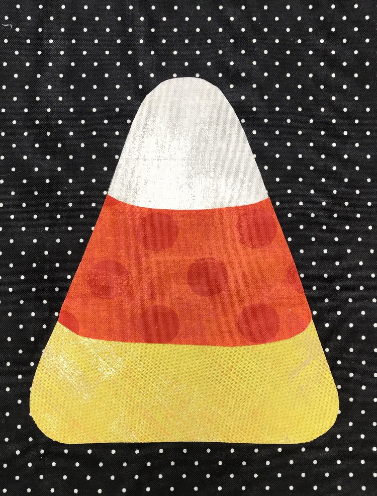 candy corn applique on black fabric